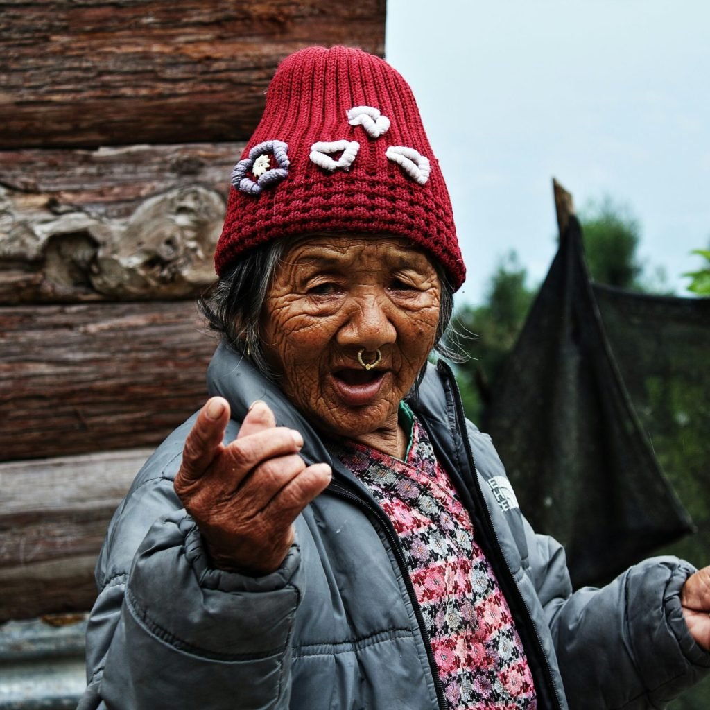 old-lady-wearing-wollen-cap-experiences-in-sikkim