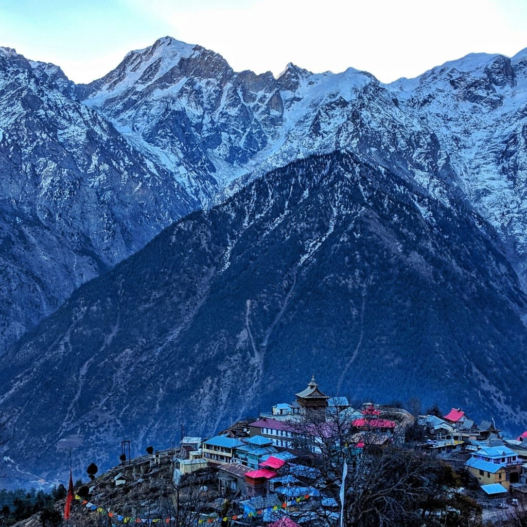 snow-peaked-mountain-and-village-in-experiences-in-himachal
