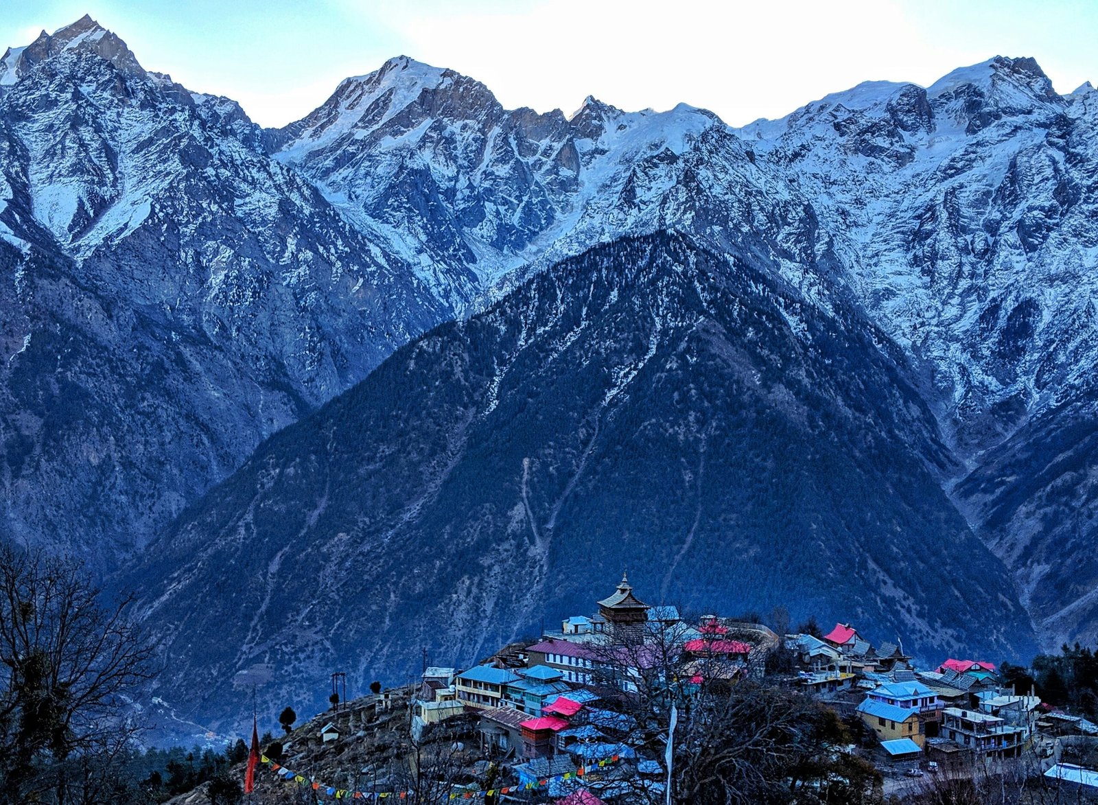 snow-peaked-mountain-and-village-in-experiences-in-himachal
